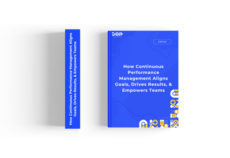 Team collaborating on setting and tracking OKRs — a practical look into effective OKR implementation for business success.